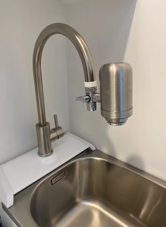 OzFlow purifier fitted to a kitchen tap