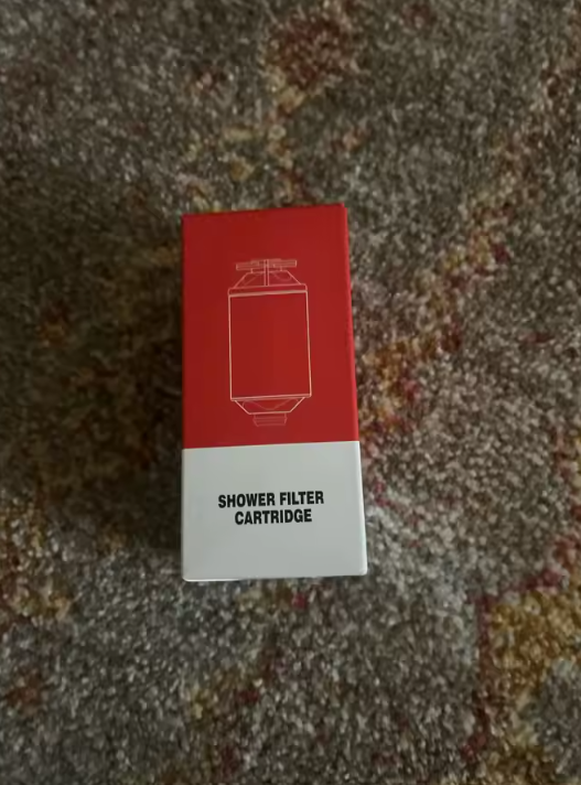 A single replacement shower cartridge carton, sealed